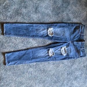 Super high rise distressed jegging